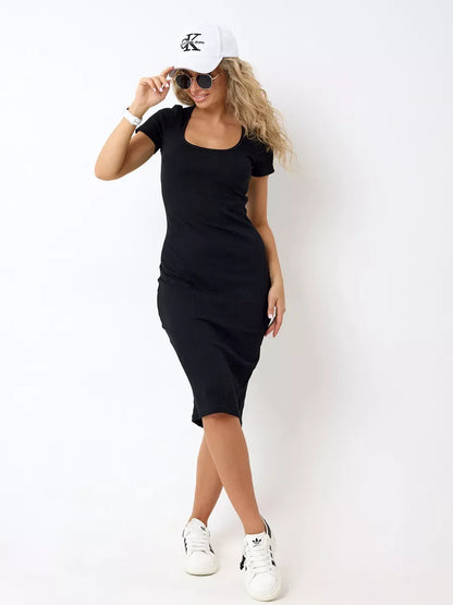 Onyx Midi Dress by Lauven, showcasing a sleek black ribbed knit silhouette, ideal for casual sophistication.