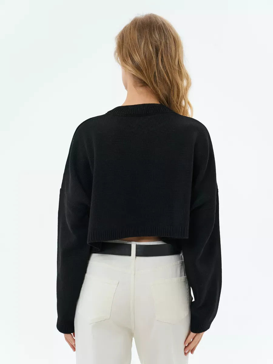 Onyx Sweater by Lauven in black, showcasing cropped oversized knit style for a modern minimalist look.