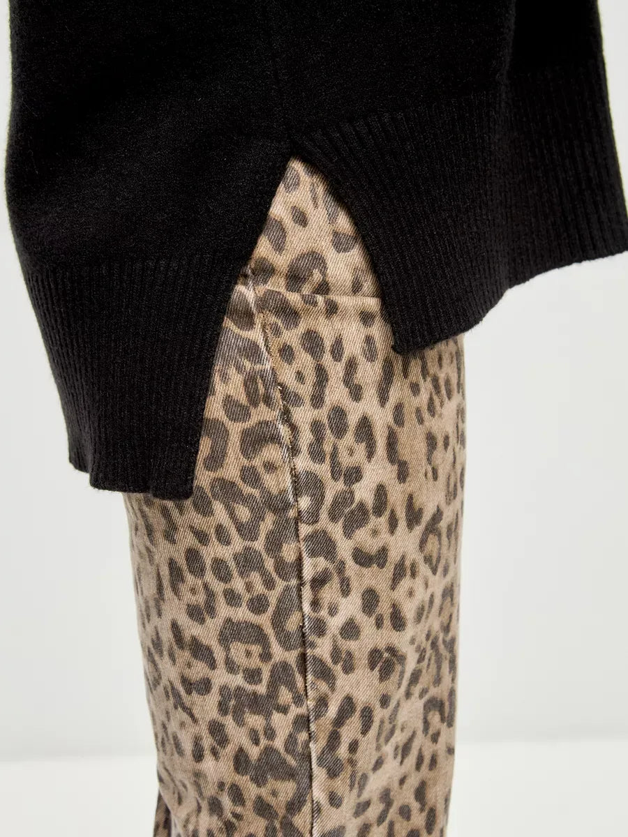 Onyx Sweater by Lauven showcasing an oversized black cashmere blend with a stylish high neck detail.