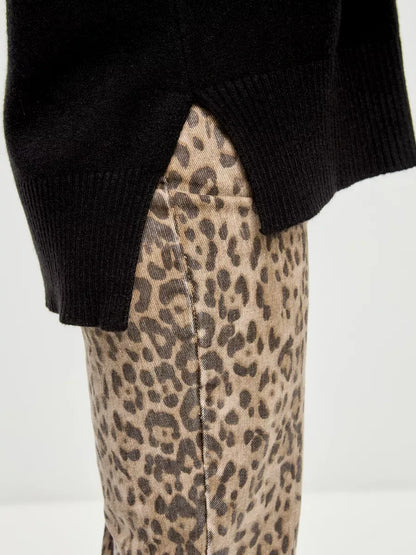 Onyx Sweater by Lauven showcasing an oversized black cashmere blend with a stylish high neck detail.