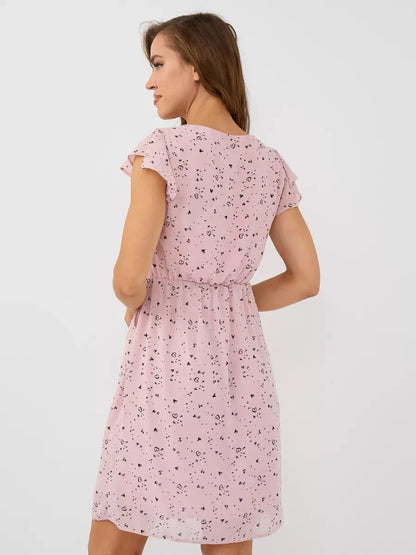 Back view of elegant Rose Mini Dress by Lauven, featuring delicate ruffle sleeves and a fitted waist.