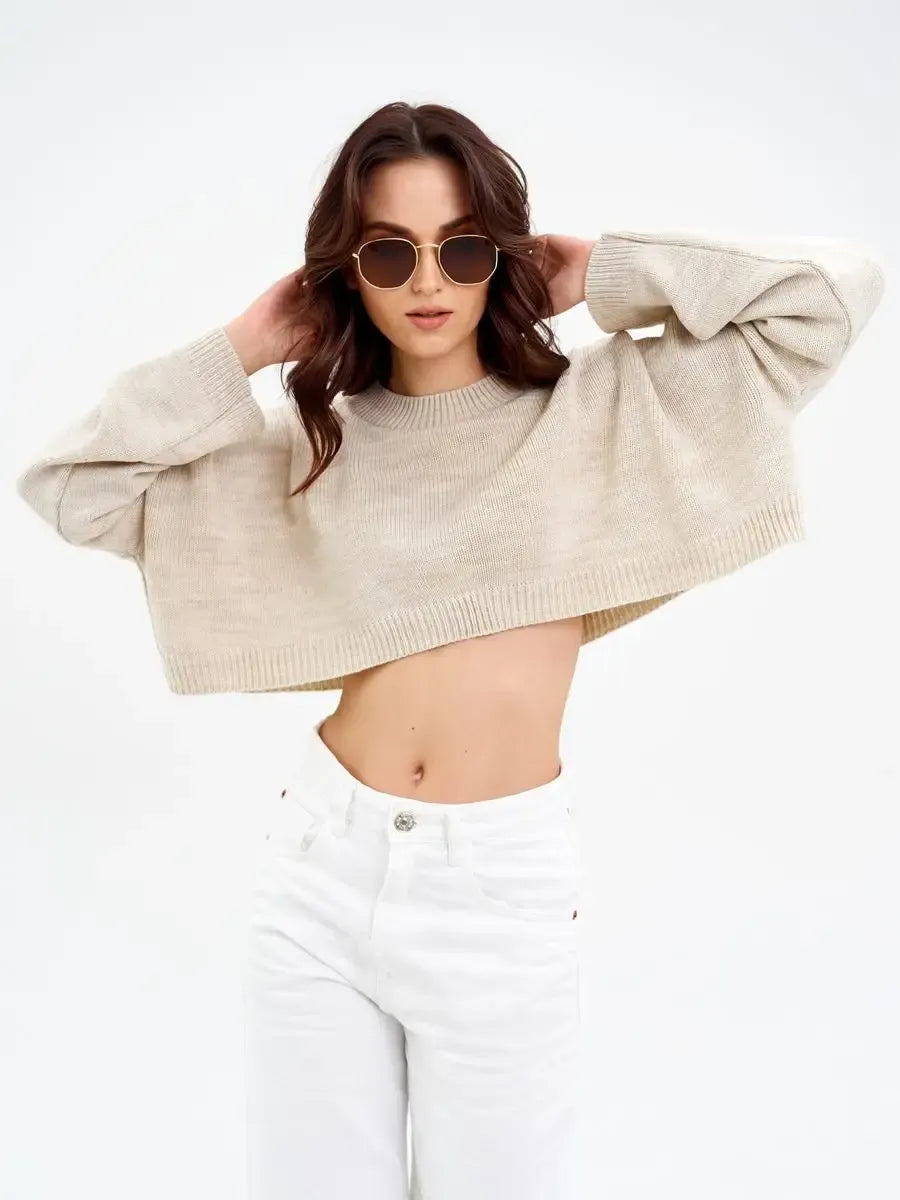 Cropped oversized Sand Sweater by Lauven in light beige, showcasing a stylish and modern look.