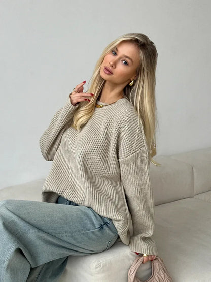 Sierra Sweater by Lauven, oversized beige knit with crew neck worn casually by a model.