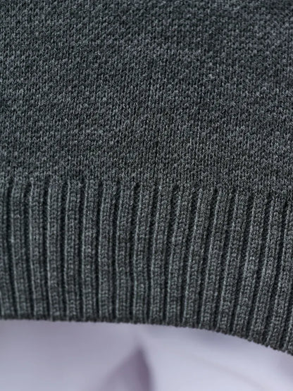 Slate Pullover by Lauven featuring a close-up of the dark gray knit texture and ribbed hem detail.