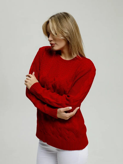 Model wearing a red Vera Pullover by Lauven, showcasing its classic fitted design and breathable knit texture.