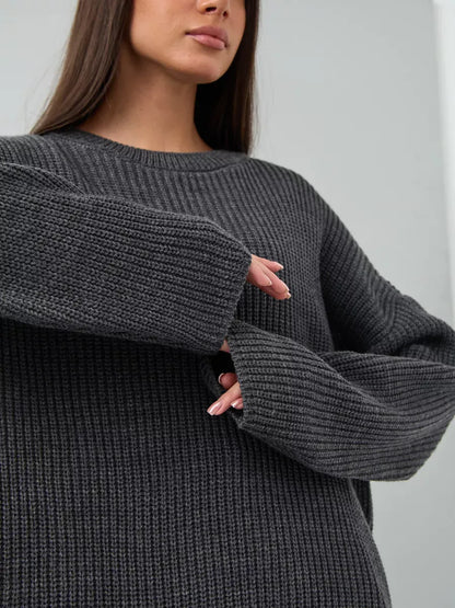 Vera Sweater by Lauven, oversized dark gray knit with crew neck, featuring chunky ribbed texture for comfort.