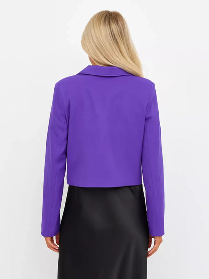 Back view of a woman wearing a cropped Violet Blazer in bold purple by Lauven, showcasing elegance and modern style.
