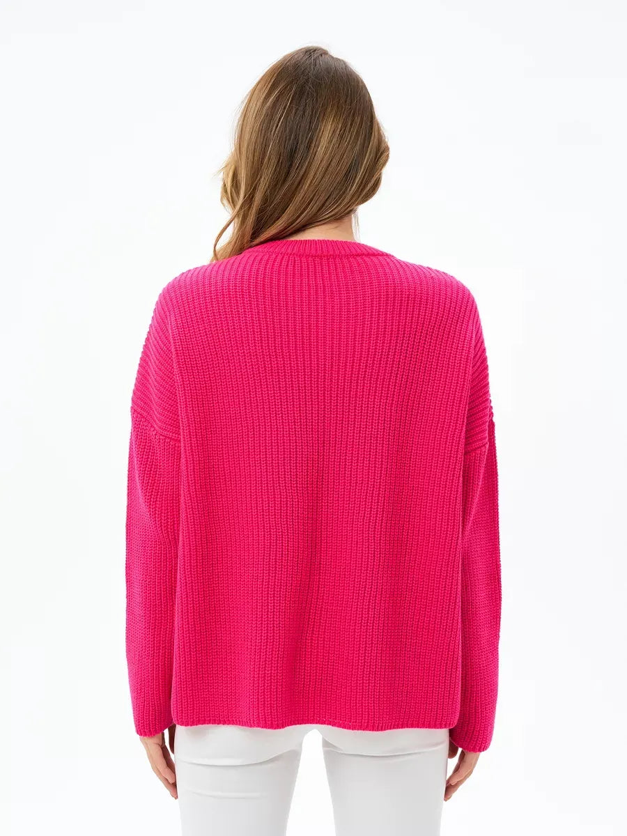 Aster Sweater by Lauven, oversized knit in vibrant fuchsia, featuring a relaxed, elongated silhouette.