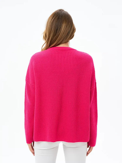 Aster Sweater by Lauven, oversized knit in vibrant fuchsia, featuring a relaxed, elongated silhouette.