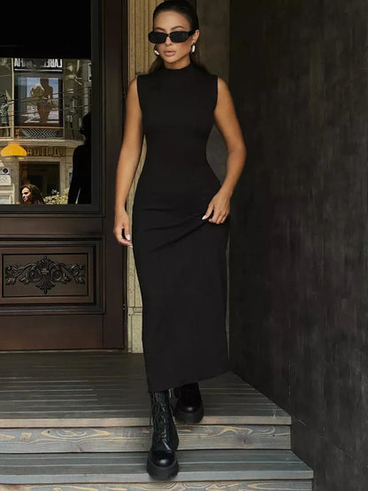 Leah Maxi Dress by Lauven, black sleeveless bodycon gown with mock neck and floor-grazing hem.