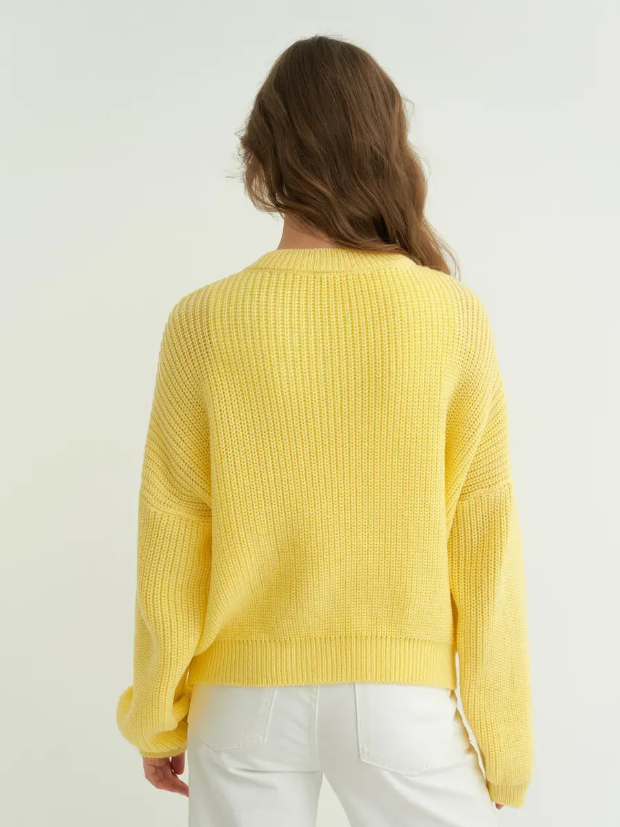 Lemonade Sweater by Lauven, oversized knit in bright yellow, showcasing a stylish back view.