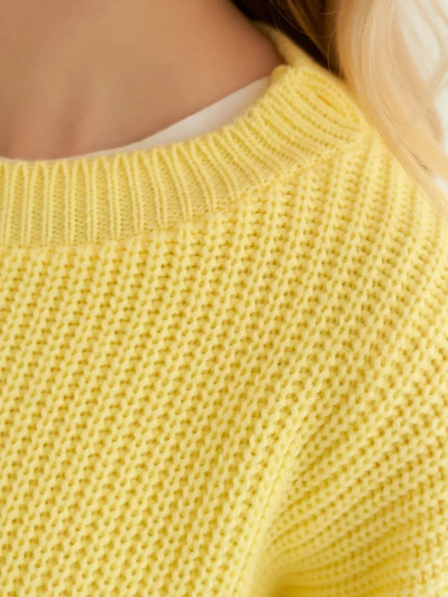 Lemonade Sweater by Lauven in soft lemon yellow ribbed knit, showcasing the oversized fit and comfortable texture.