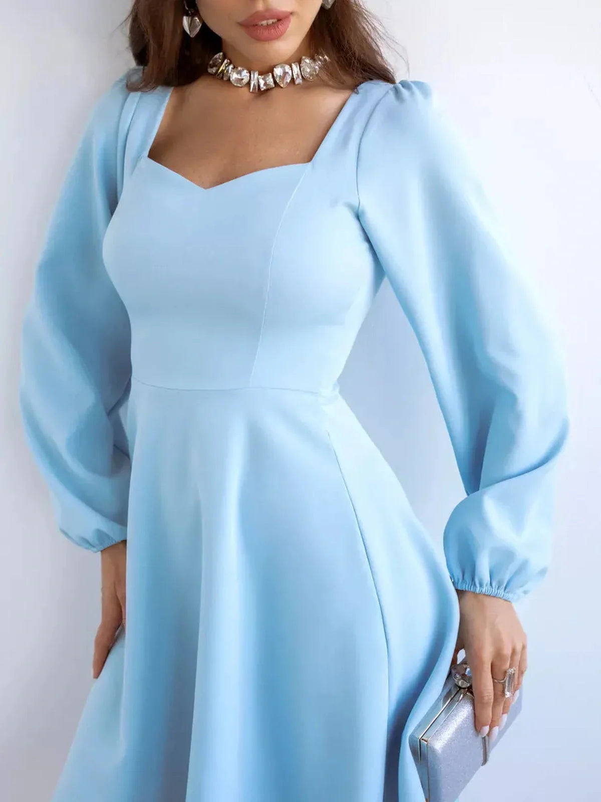 Skyline Mini Dress by Lauven, light blue flared cocktail dress with long sleeves and square neckline.