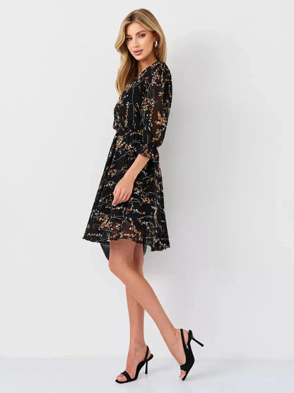 Lotus Mini Dress by Lauven, black floral wrap dress with deep V-neckline and 3/4 sleeves.