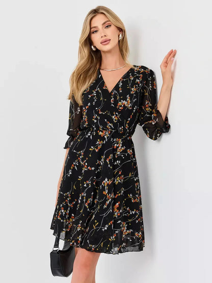 Lotus Mini Dress by Lauven, black floral wrap dress with V-neckline and 3/4 sleeves, perfect for stylish occasions.