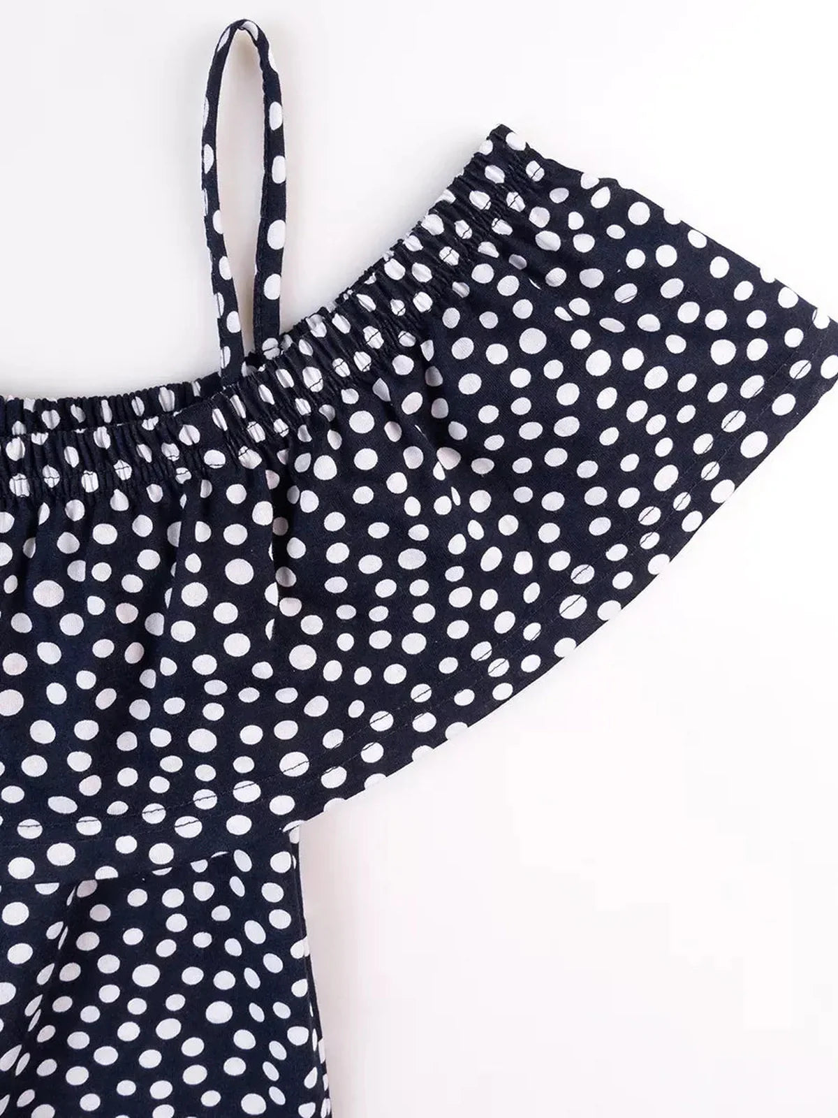 Lucy Mini Dress by Lauven - Navy polka dot cotton fabric with off-shoulder ruffle detail.