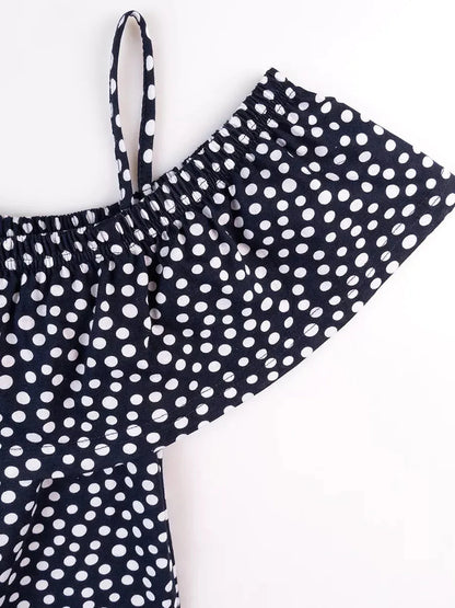 Lucy Mini Dress by Lauven - Navy polka dot cotton fabric with off-shoulder ruffle detail.