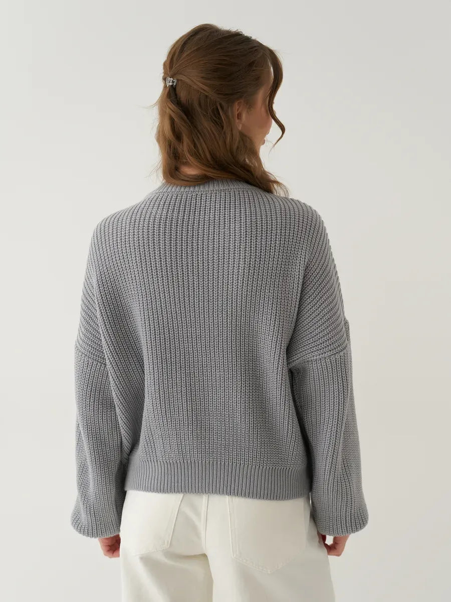 Luna Sweater by Lauven – back view of oversized light grey rib-knit sweater showcasing relaxed fit.