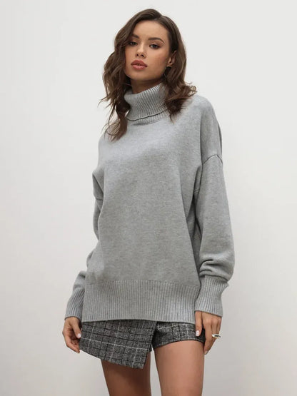 Lyra Sweater by Lauven – Light grey turtleneck knitwear essential, showcasing relaxed silhouette and cozy sophistication.