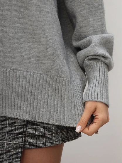 Lyra Sweater by Lauven, light grey turtleneck knitwear, showcasing details of soft knit fabric and relaxed silhouette.