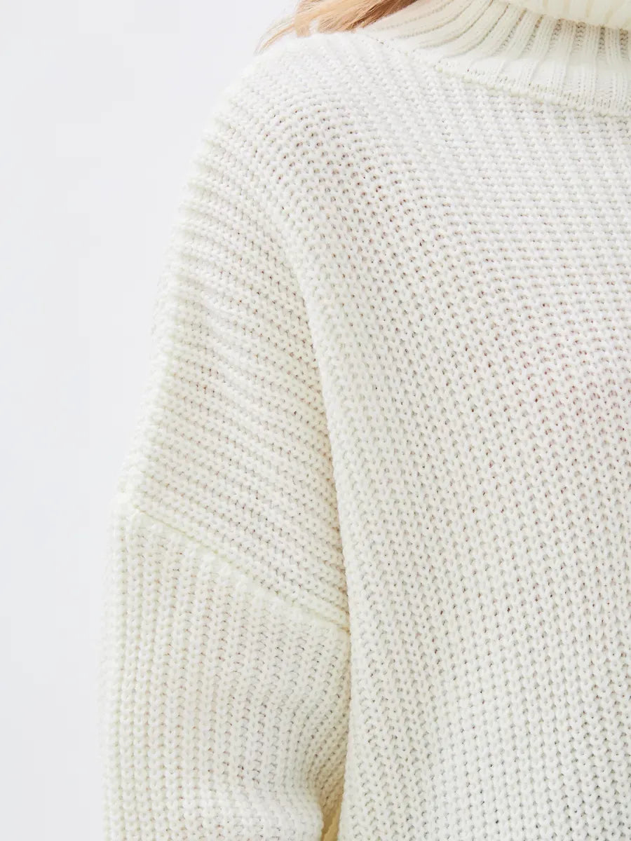 Lyra Sweater by Lauven - Oversized ivory knit with high neck detail, perfect for casual elegance.