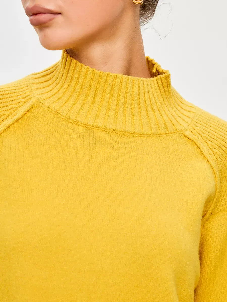 Marigold Sweater by Lauven in a luxurious cashmere blend featuring a high neck and ribbed finish.