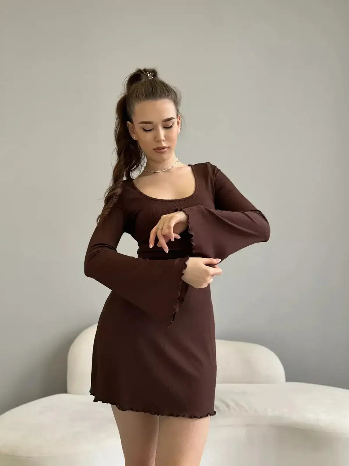 Mia Mini Dress by Lauven in cocoa ribbed knit, long sleeve, scoop neckline with tie-back, showcasing a stylish fit.