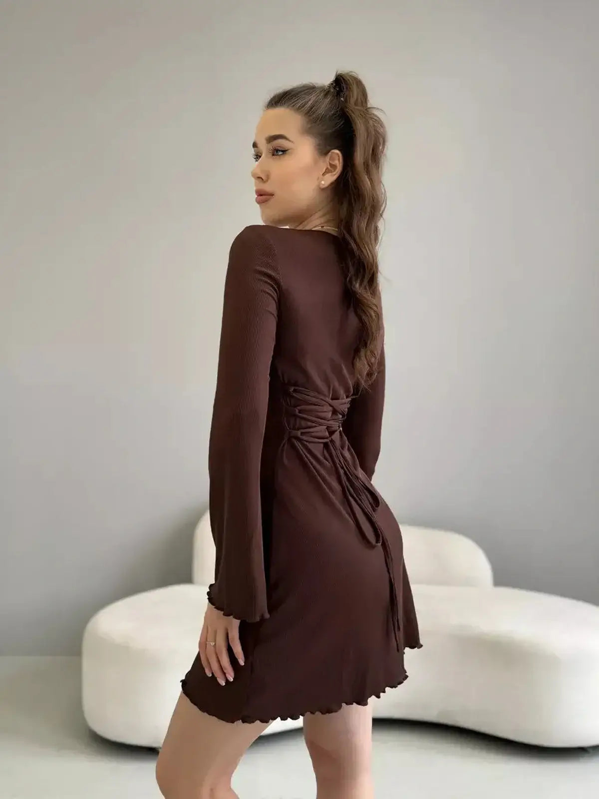 Mia Mini Dress by Lauven in cocoa ribbed knit with long sleeves and tie-back design.