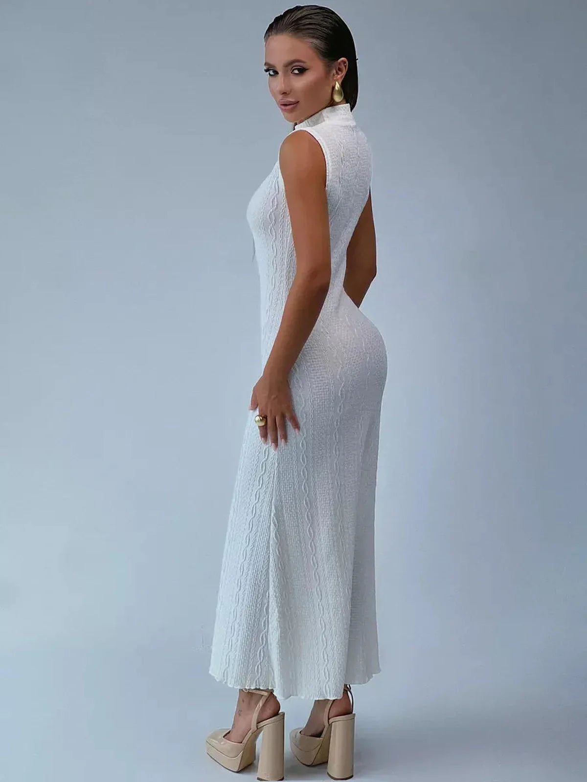 Mila Maxi Dress by Lauven, sleeveless bodycon gown with high collar and textured jacquard knit, showcasing a slim-fit silhouette.
