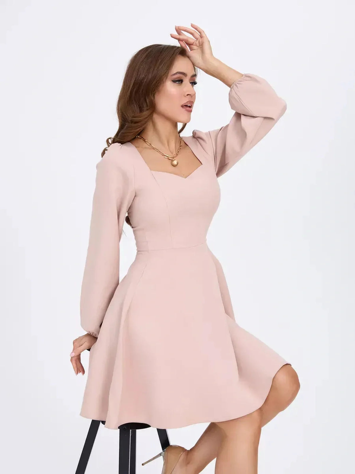 Milanese Mini Dress by Lauven in blush pink with long sleeves, A-line skirt, and square neckline. Perfect for chic occasions.