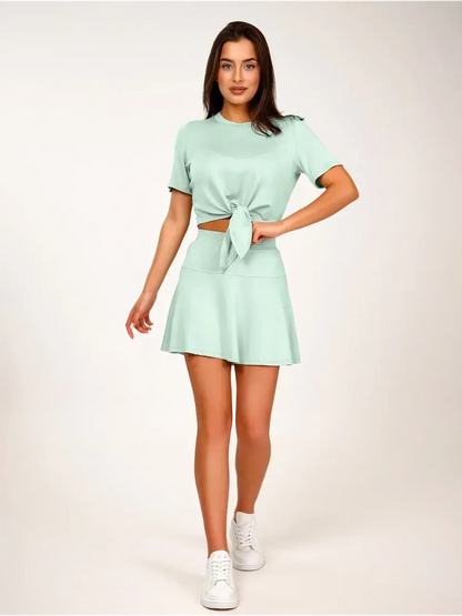 Mint Set – Mint green two-piece outfit featuring a cropped tie-front top and flared mini skirt.