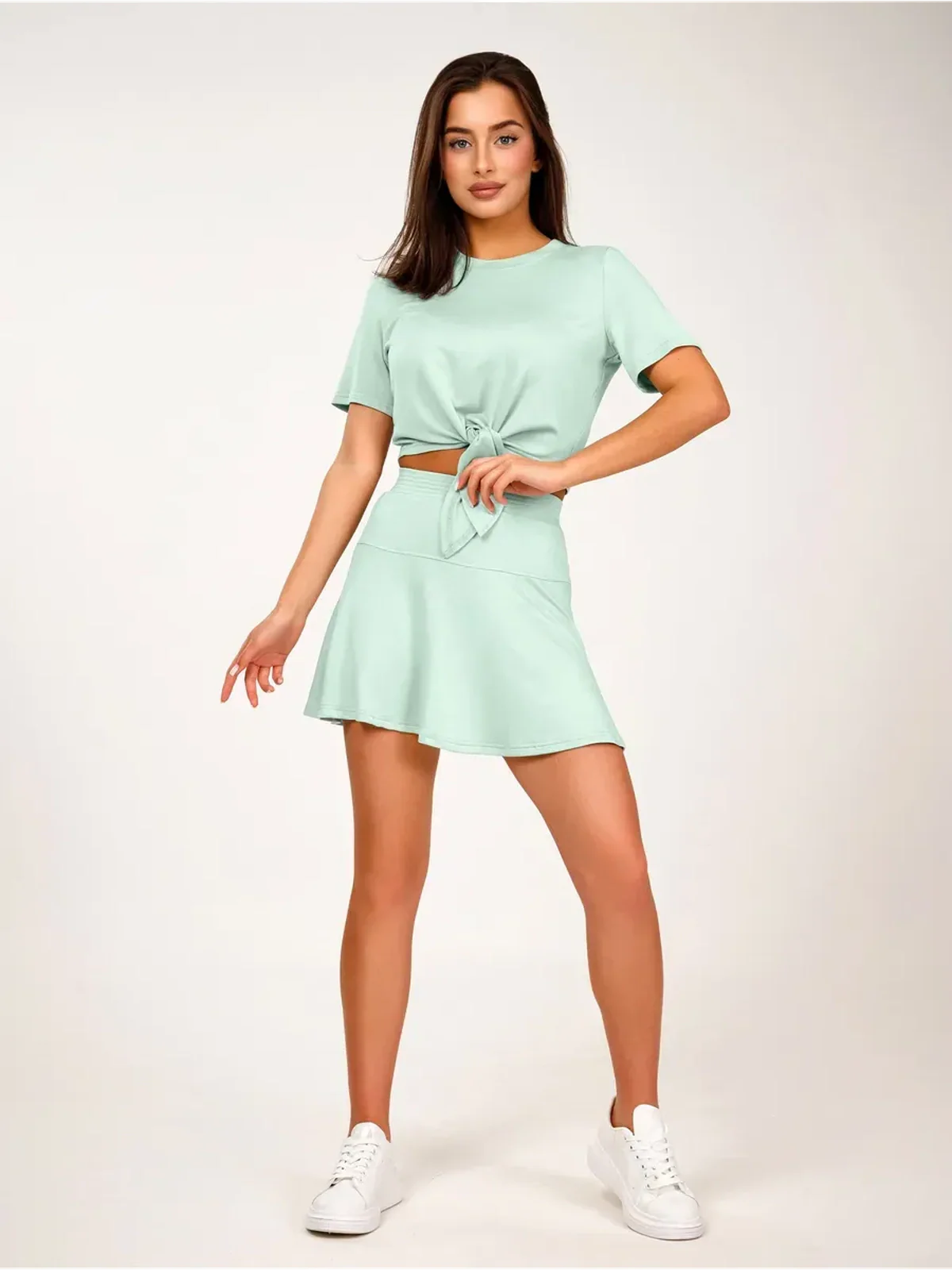Mint Set – Mint green two-piece suit featuring a cropped tie-front top and flared mini skirt.