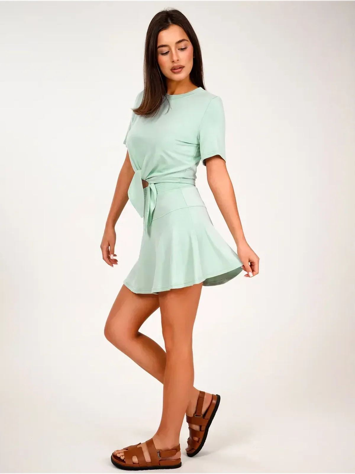 Mint Set - Mint green two-piece women’s suit with cropped tie-front top and flared mini skirt.