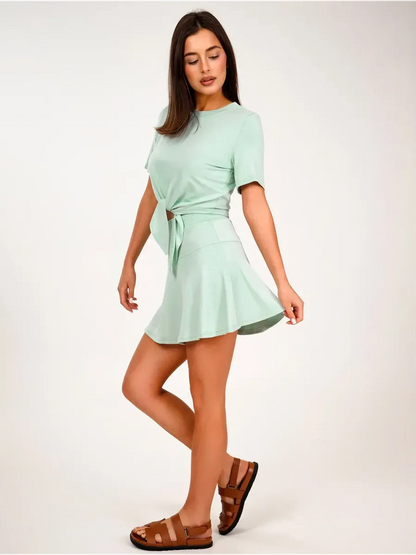 Mint Set - Mint green two-piece women’s suit with cropped tie-front top and flared mini skirt.