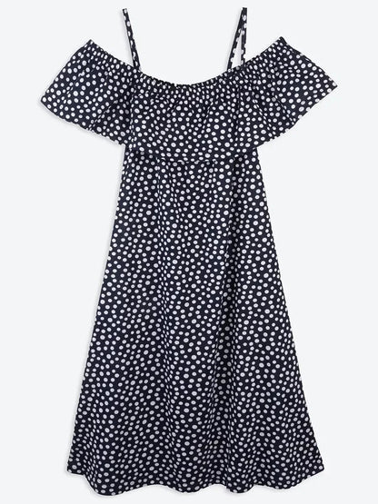 Lucy Mini Dress by Lauven in navy with white polka dots, off-shoulder ruffle, and A-line silhouette.