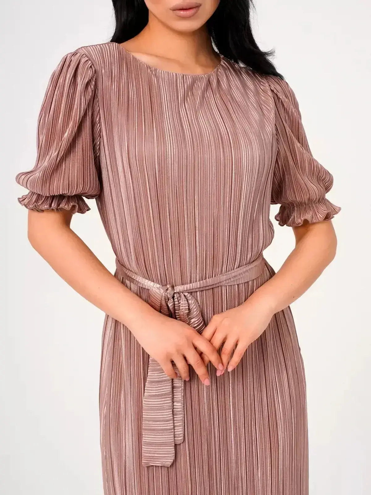 Noa Maxi Dress featuring elegant pleats, puff sleeves, and a fluid drape in light cappuccino hue.
