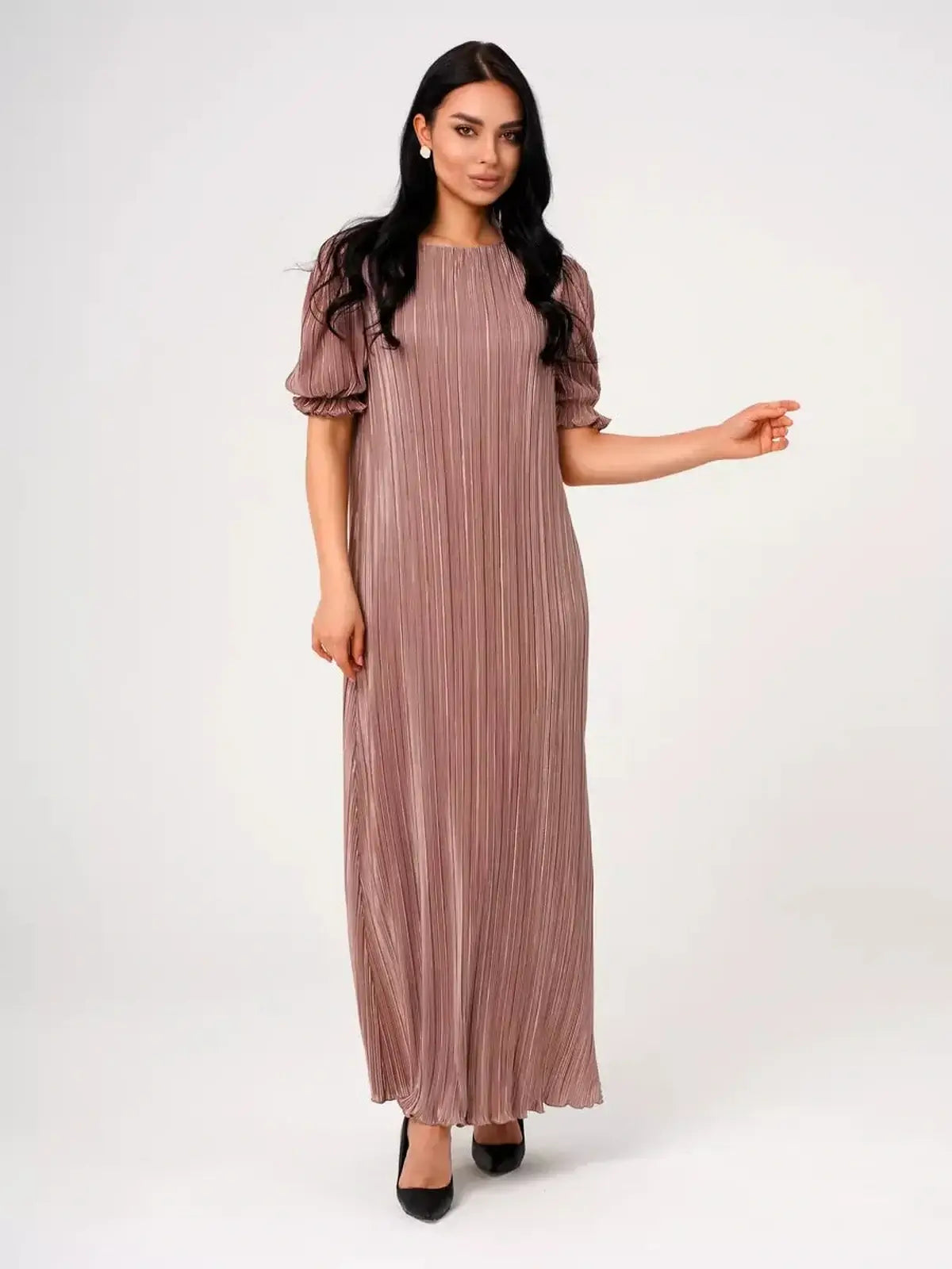 Noa Maxi Dress featuring elegant pleats, puff sleeves, and a lustrous drape in a light cappuccino hue.