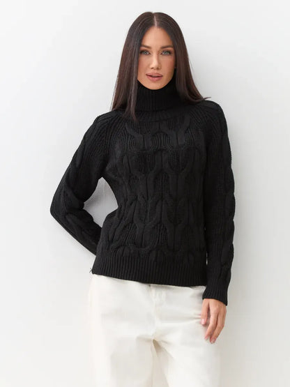 Noir Knitwear by Lauven - Women’s wool-blend turtleneck sweater featuring a chunky cable-knit design in black.