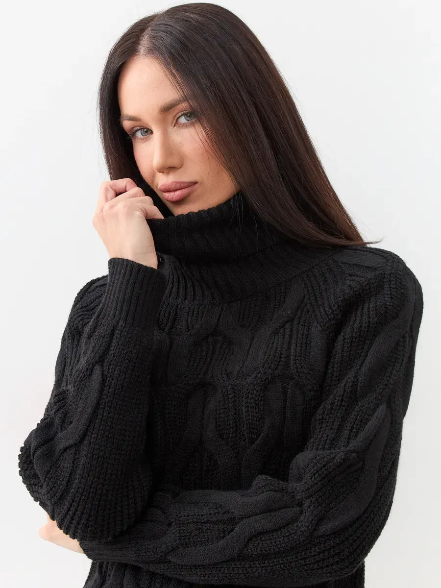 Noir Knitwear by Lauven, women's wool-blend chunky cable-knit turtleneck sweater in black, offering warmth and style.