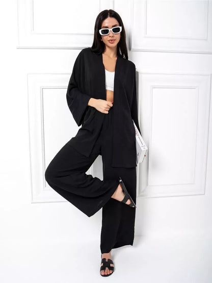 Noir Suit Set by Lauven - Chic oversized two-piece set in classic black, featuring wide-leg trousers and modern styling.