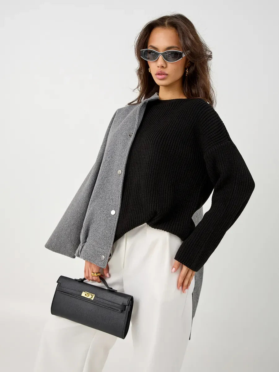 Nola Sweater by Lauven, oversized black knit with crew neck, styled with sunglasses and handbag.