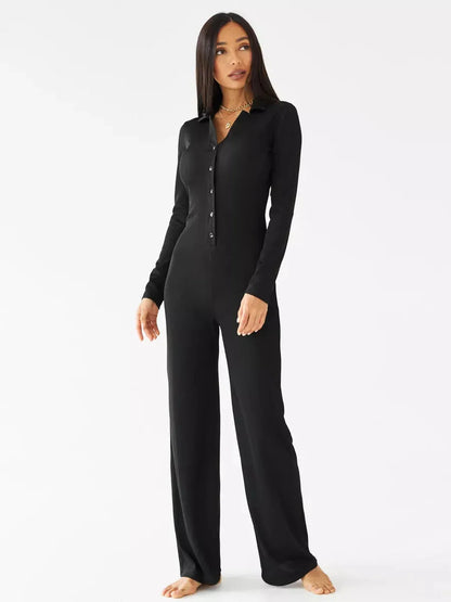 Nora Jumpsuit in black, featuring a ribbed knit fabric, button details, and wide-leg fit for casual or formal wear.