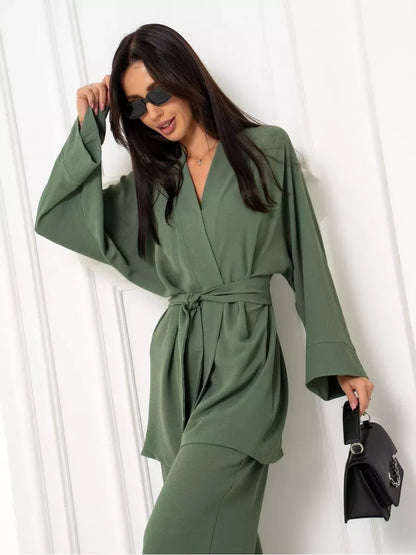 Olive Suit Set by Lauven displayed on a model, featuring an elegant oversized look in soft green fabric.