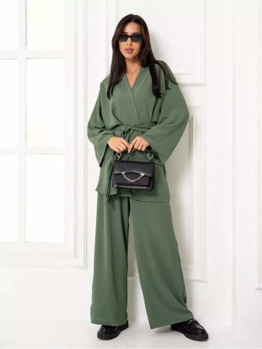 Olive Suit Set by Lauven, featuring an elegant oversized two-piece in soft green fabric with wide-leg trousers.