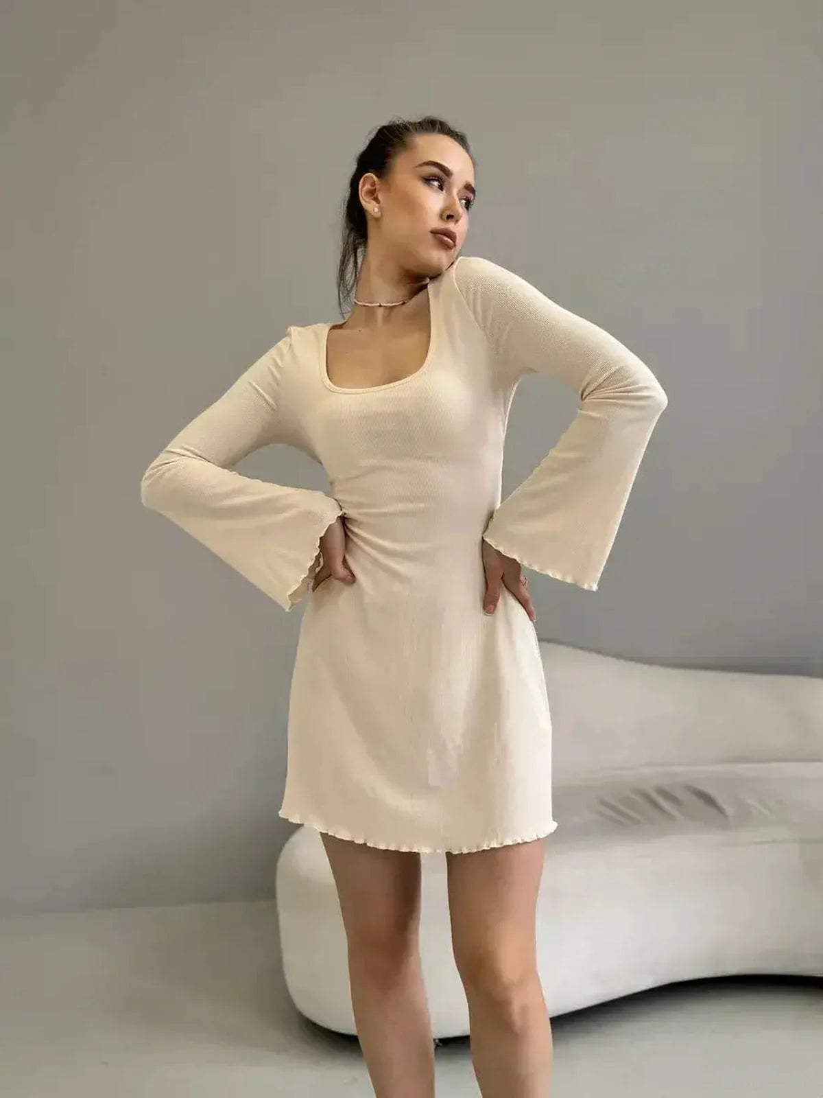 Olivia Mini Dress by Lauven in beige ribbed knit with square neckline and bell sleeves.