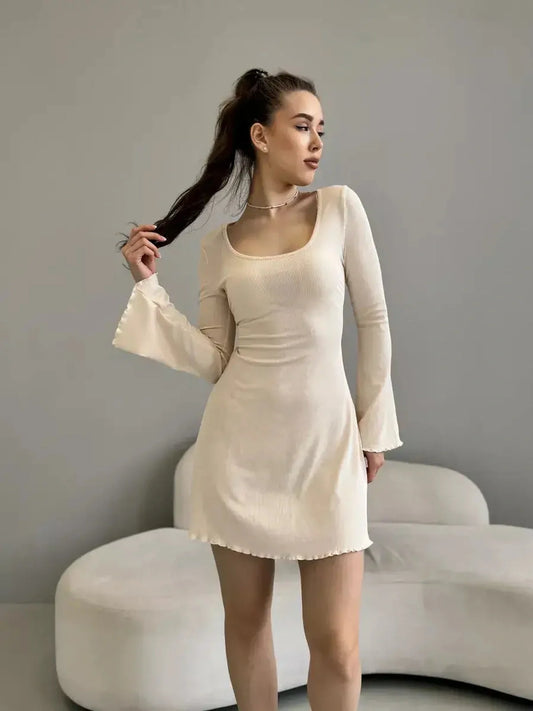 Olivia Mini Dress by Lauven - Beige ribbed knit long sleeve with square neckline and back tie, showcasing modern elegance.