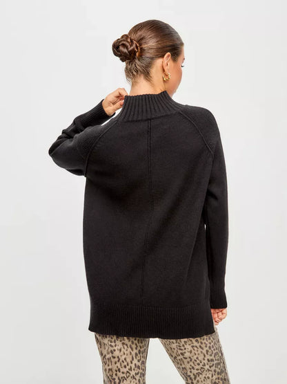 Onyx Sweater by Lauven, oversized black cashmere blend with a high neck, showcasing a relaxed fit and stylish design.