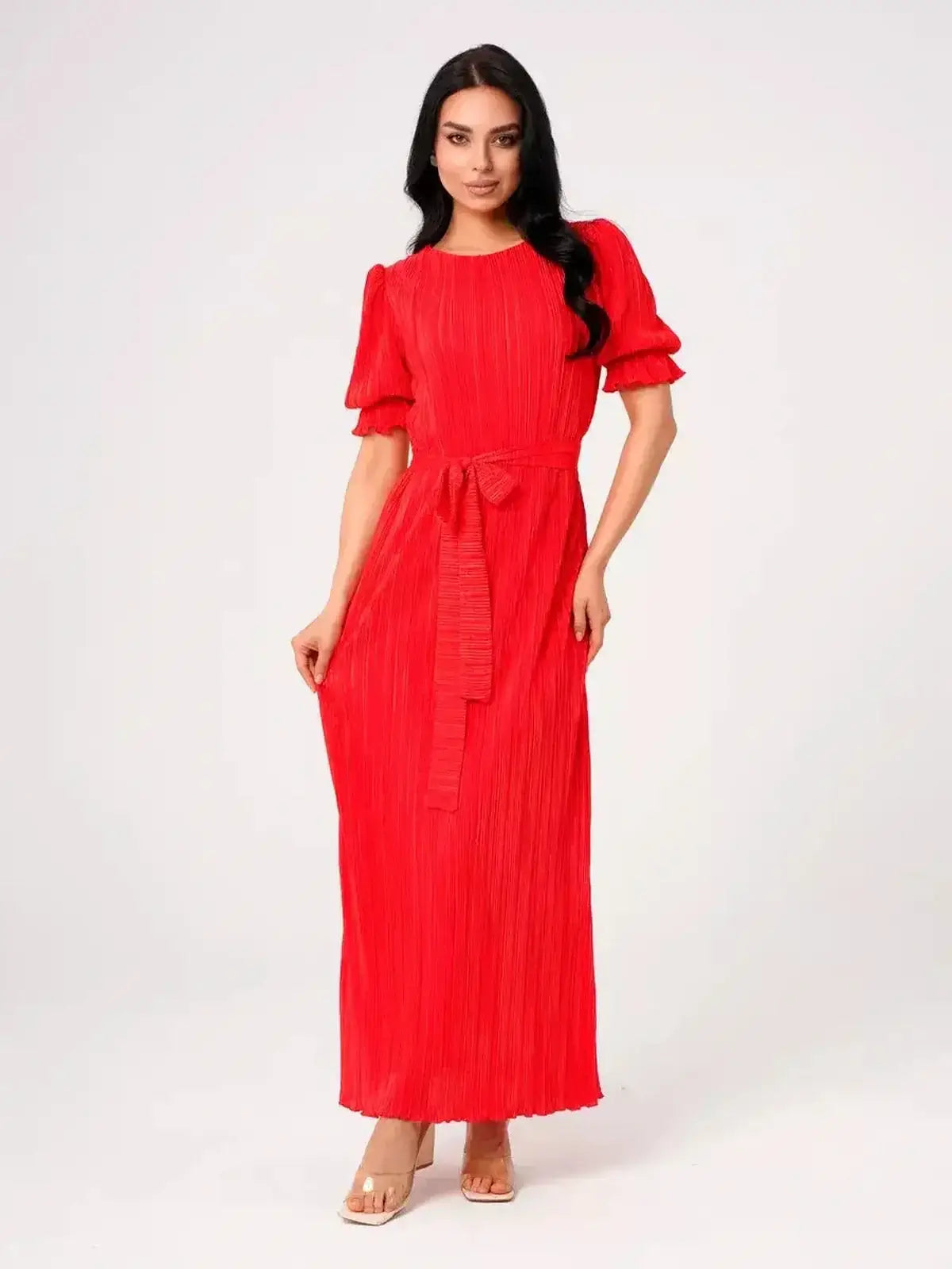Ophelia Maxi Dress showcased in bright red, featuring pleated design, romantic puff sleeves, and a belted waist for a refined silhouette.