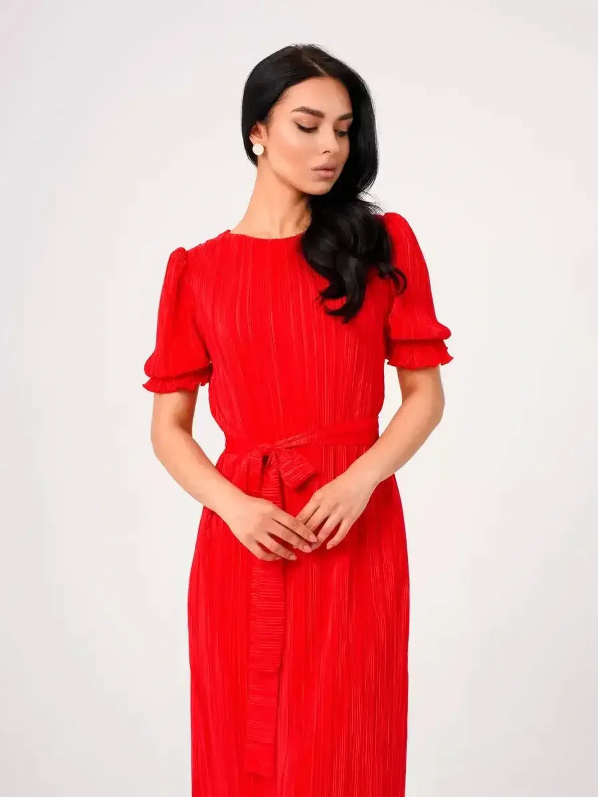 Ophelia Maxi Dress in vibrant red with pleats and puff sleeves, featuring a belted waist for elegant summer styling.