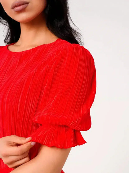 Close-up of Ophelia Maxi Dress showing pleated red fabric and puff sleeve details.